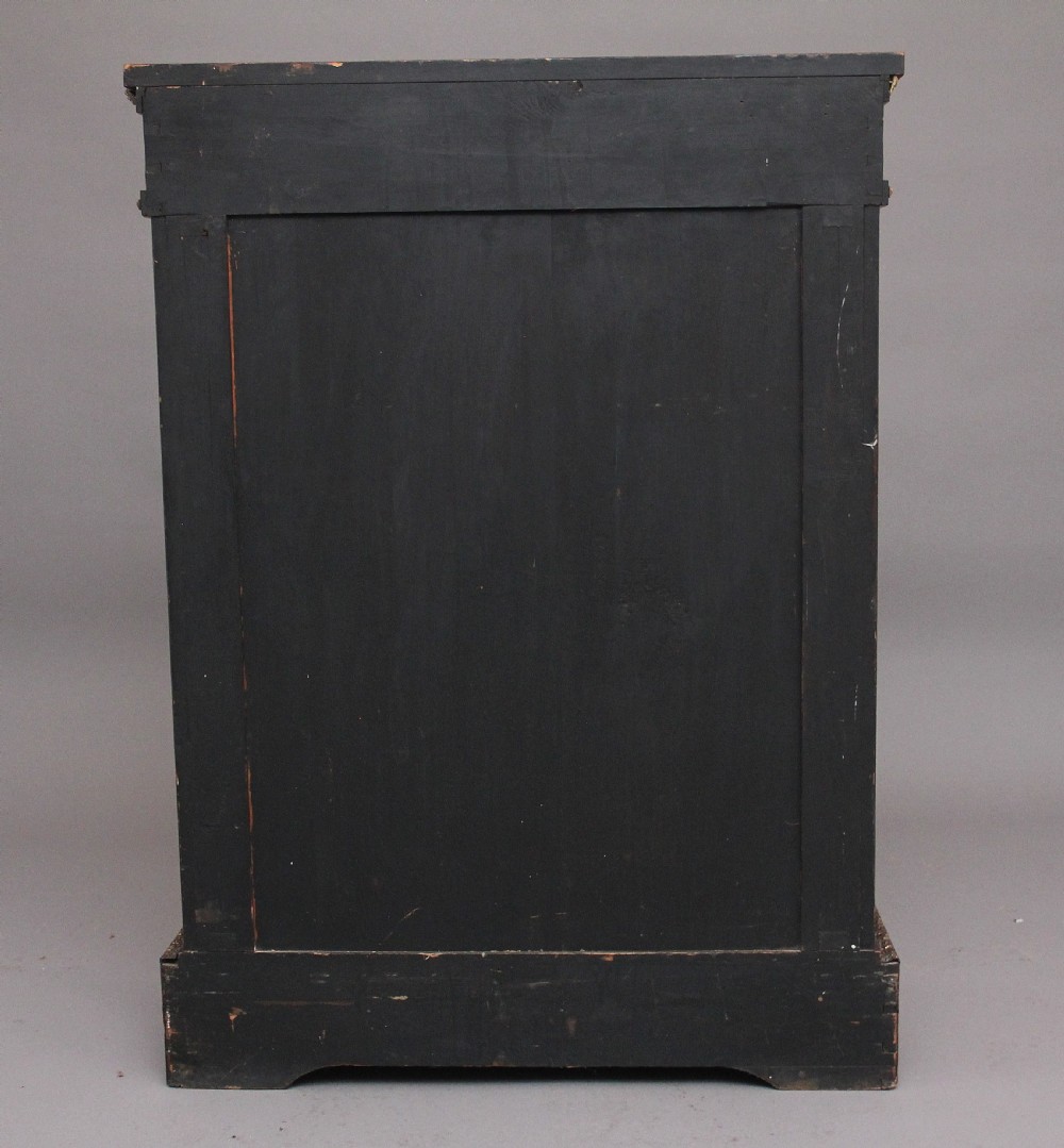 A nineteenth-century walnut pier cabinet featuring intricate floral marquetry, gilt metal mounts, and a central glazed door. View VI