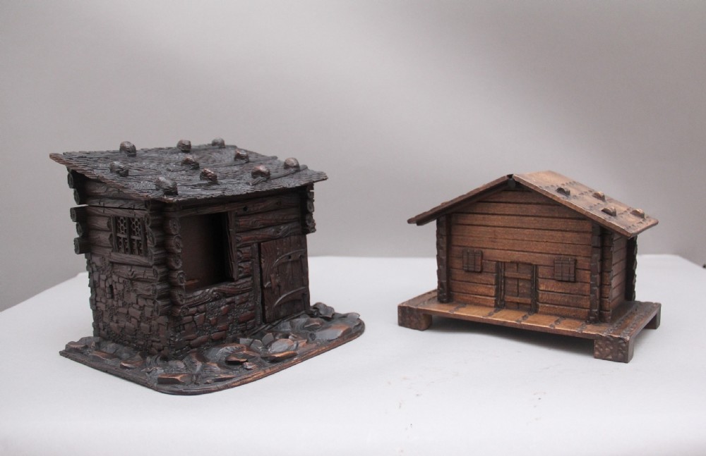 Two decorative 19th Century black forest cottages
