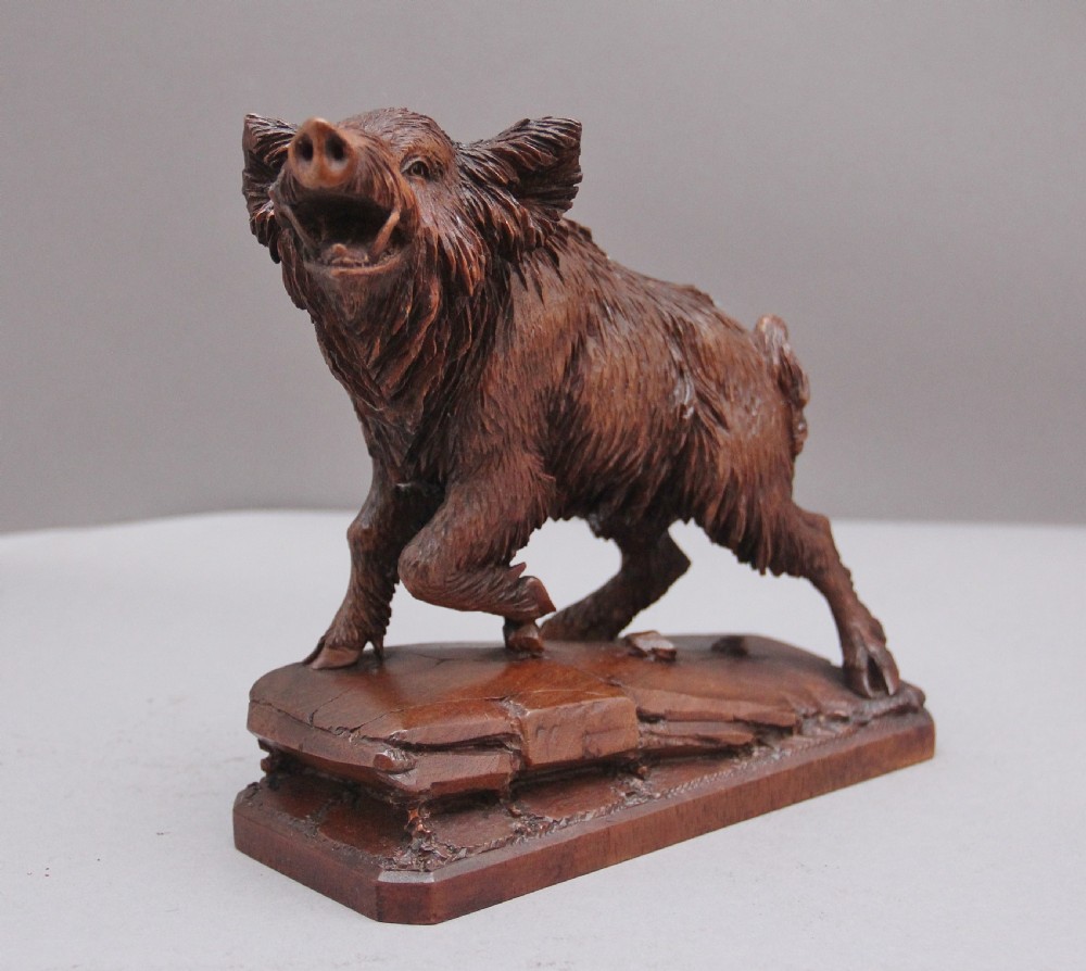 A lovely quality 19th Century black forest carving of a wild boar