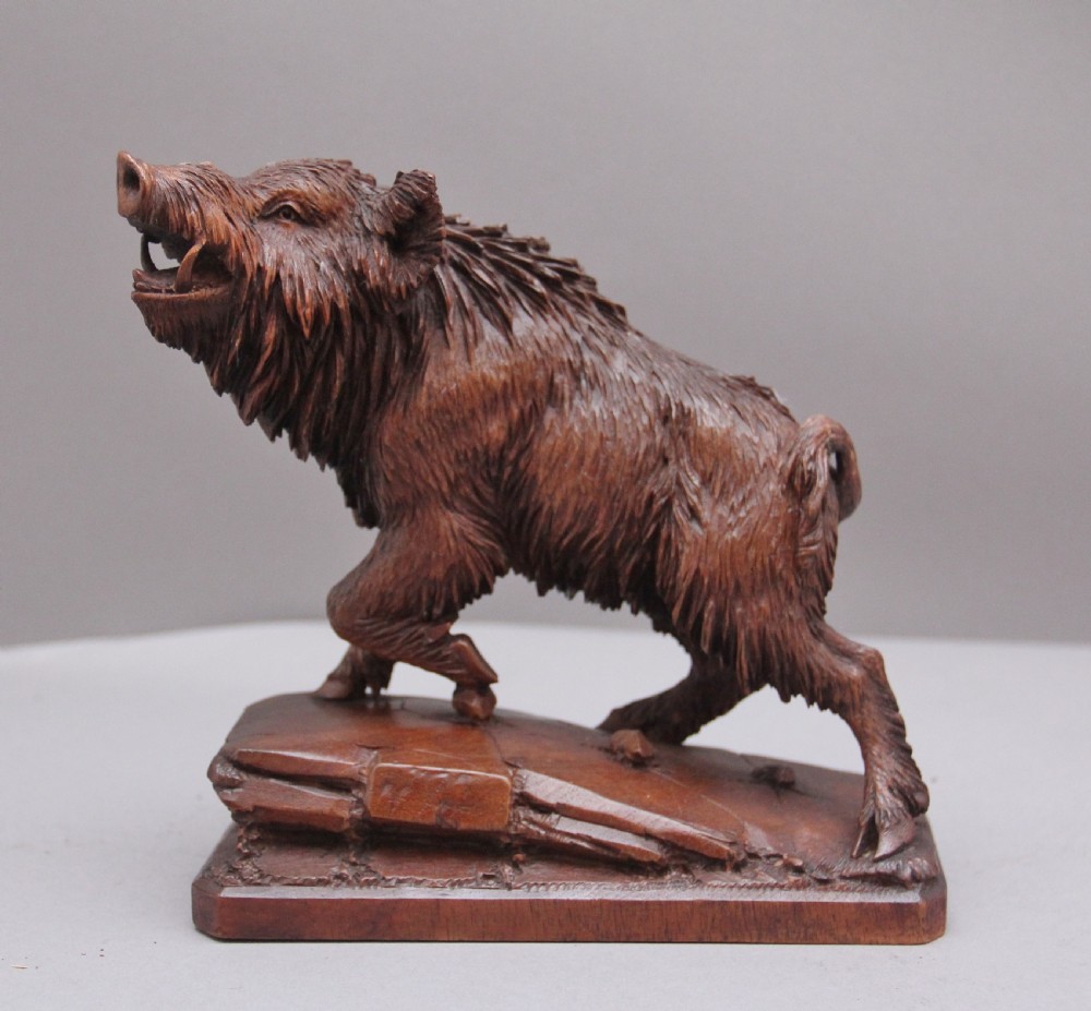 A lovely quality 19th Century black forest carving of a wild boar View II