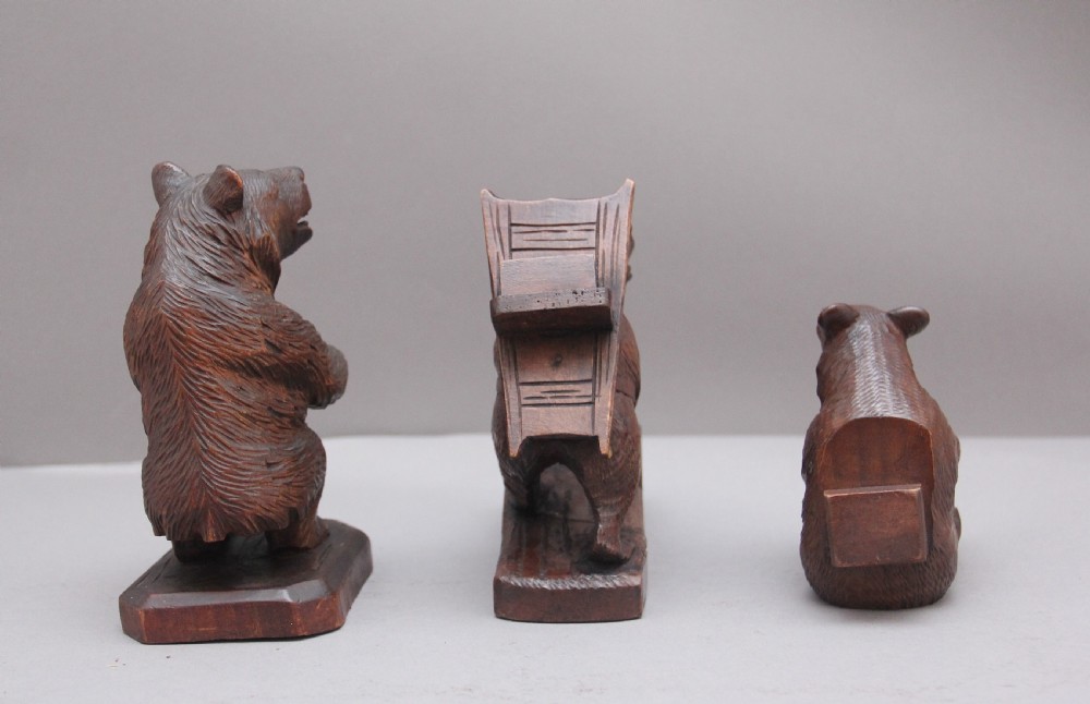 A set of three 19th Century black forest carvings of bears in different poses View IV