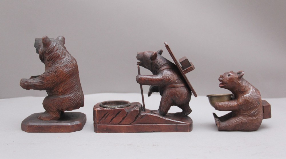 A set of three 19th Century black forest carvings of bears in different poses View V