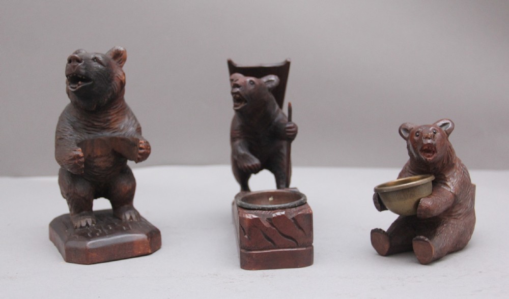 A set of three 19th Century black forest carvings of bears in different poses View VI