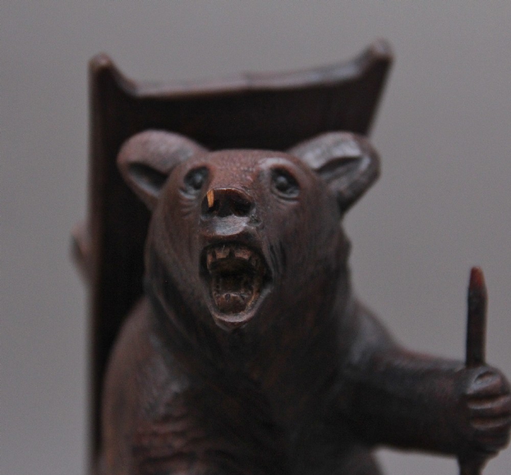 A set of three 19th Century black forest carvings of bears in different poses View VIII