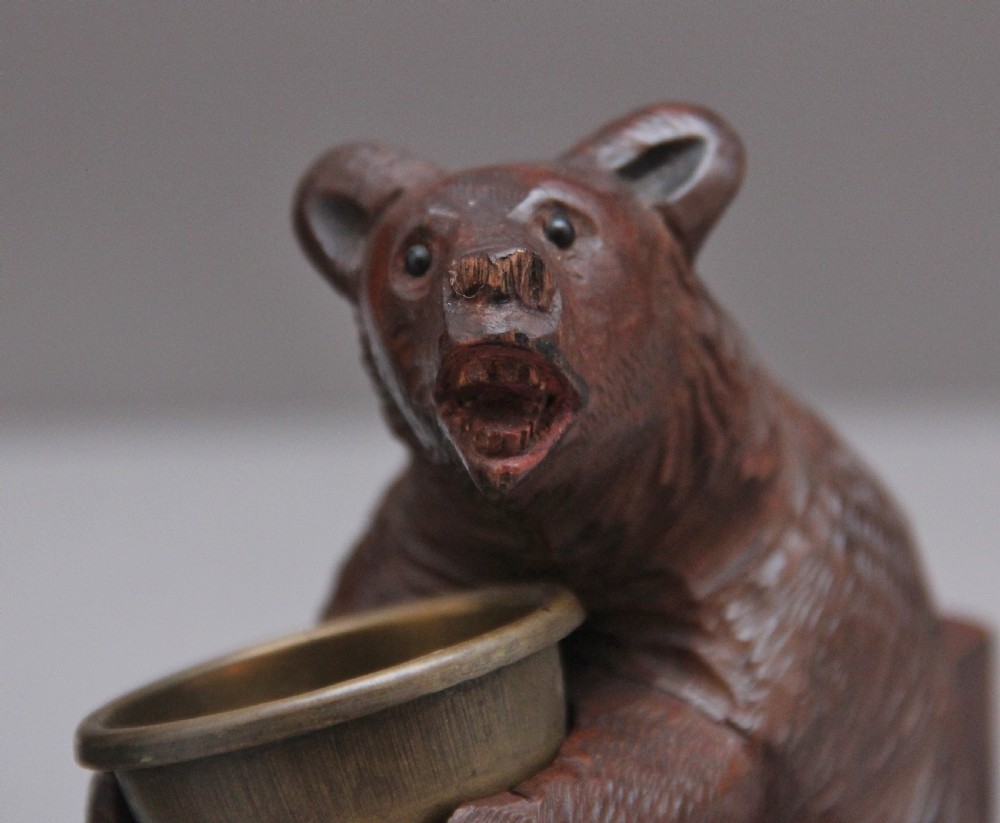 A set of three 19th Century black forest carvings of bears in different poses View IX