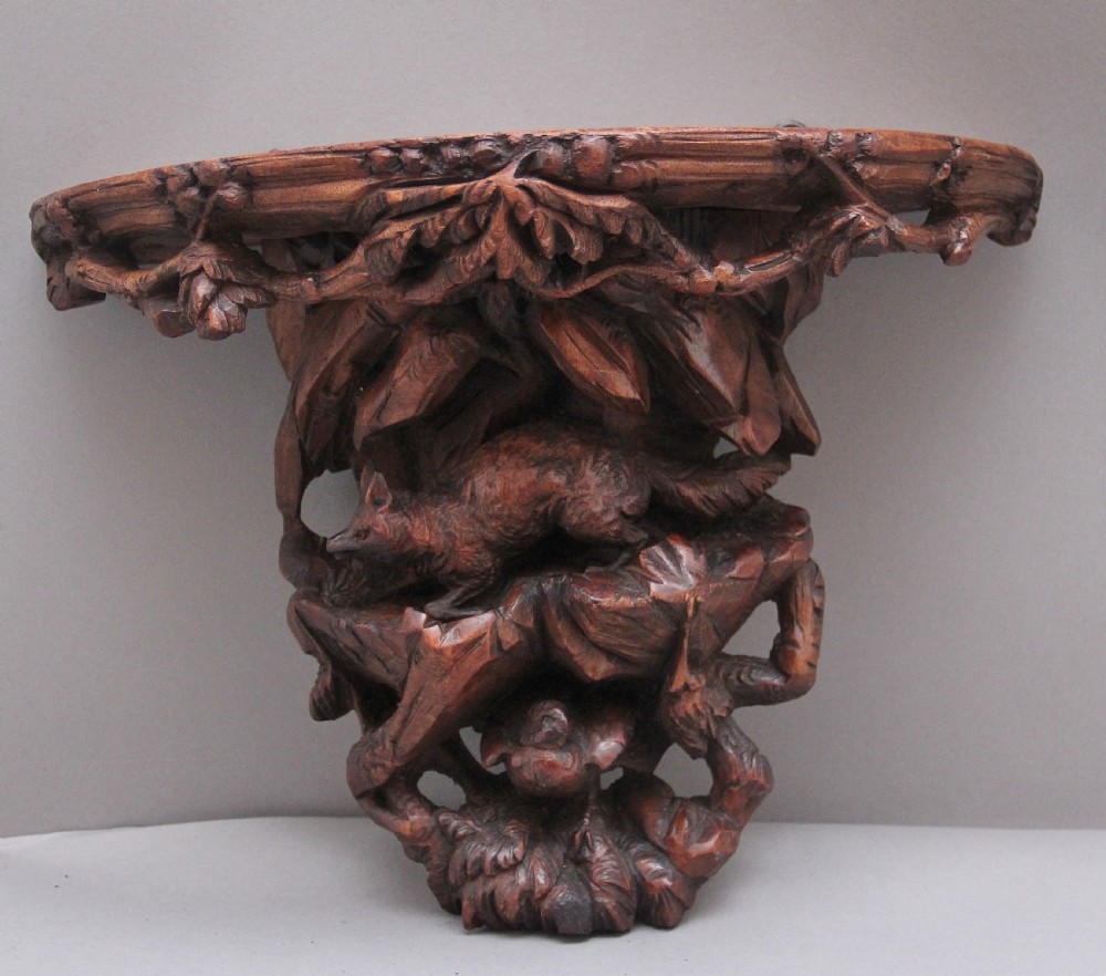19th Century black forest carved wall bracket