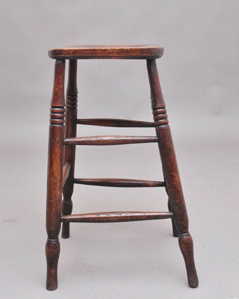 A tall mid 19th Century ash and elm stool View VI