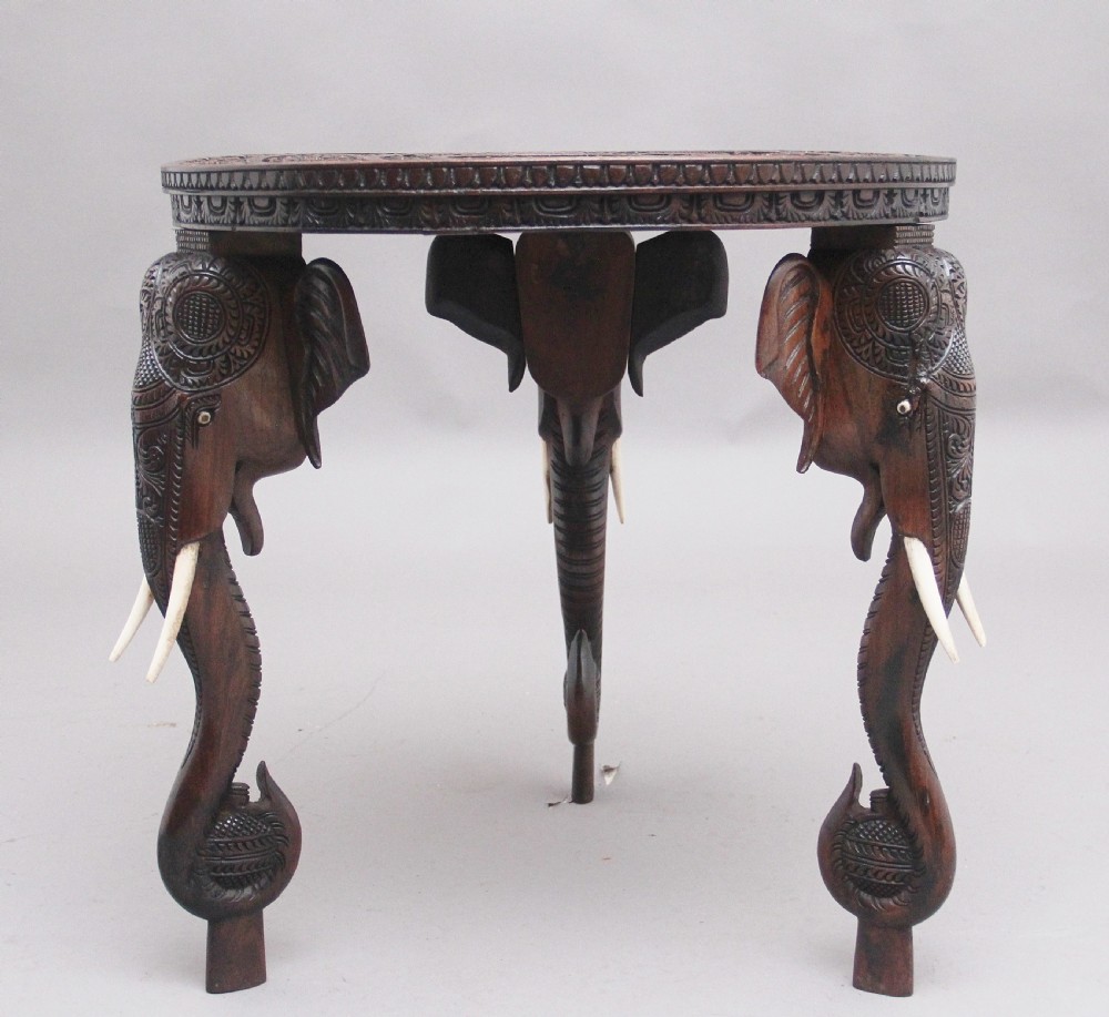 A superb quality 19th Century Anglo-Indian carved elephant occasional table View IV