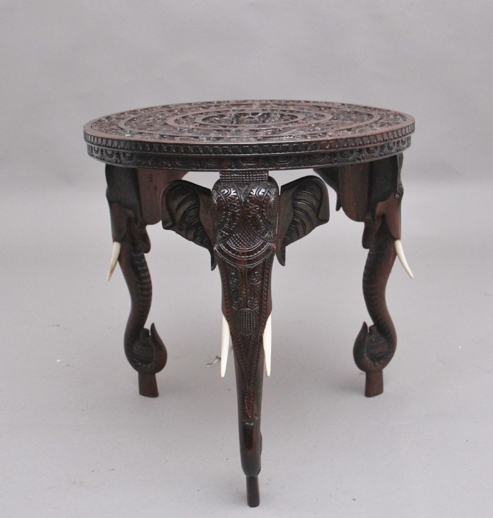 A superb quality 19th Century Anglo-Indian carved elephant occasional table View V