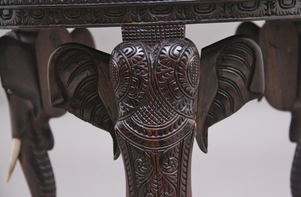 A superb quality 19th Century Anglo-Indian carved elephant occasional table View VIII