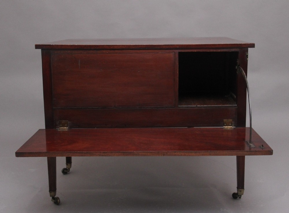 An 18th-century mahogany drop-leaf side table featuring two end drawers with brass bail handles and square tapered legs ending in brass castors. View XI