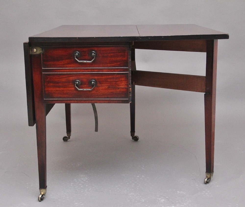An 18th-century mahogany drop-leaf side table featuring two end drawers with brass bail handles and square tapered legs ending in brass castors. View XIII