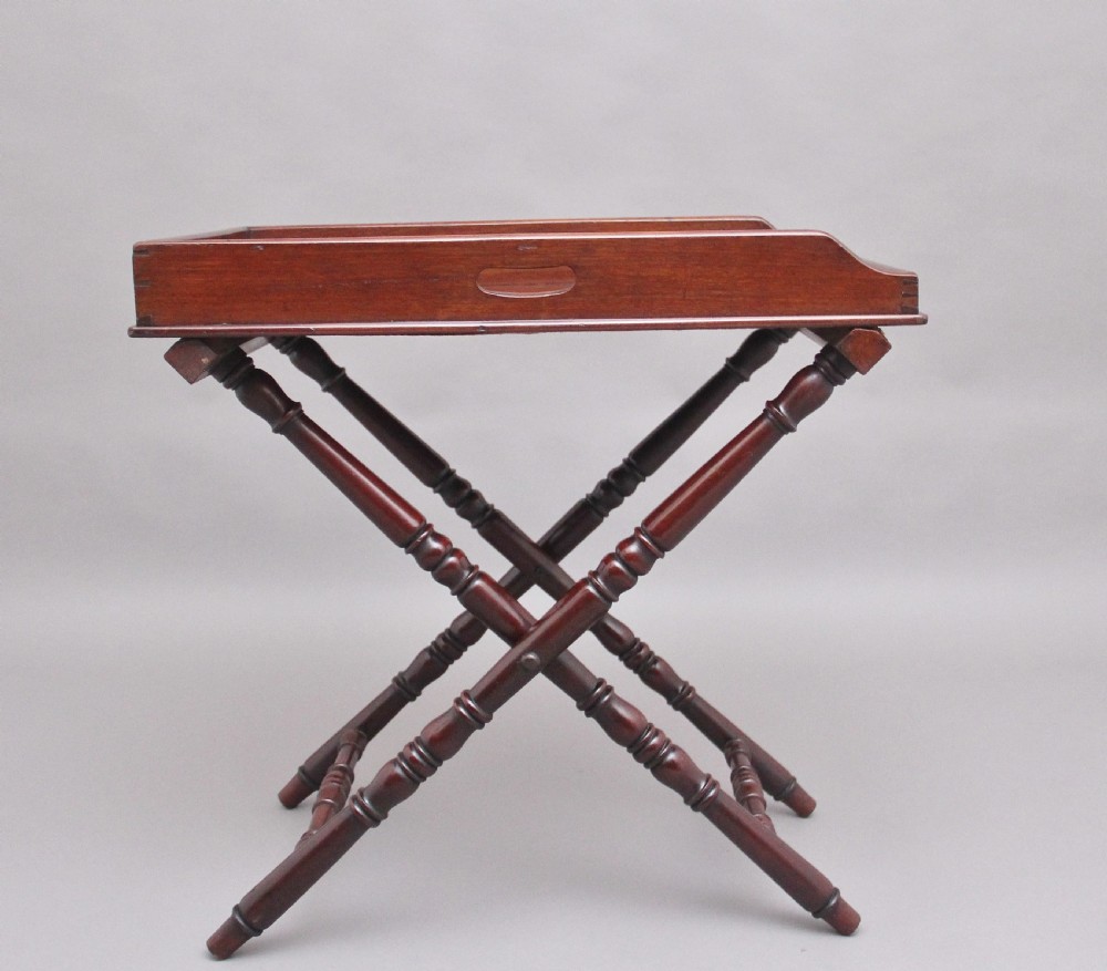 A lovely quality early 19th Century mahogany butlers tray on stand View II