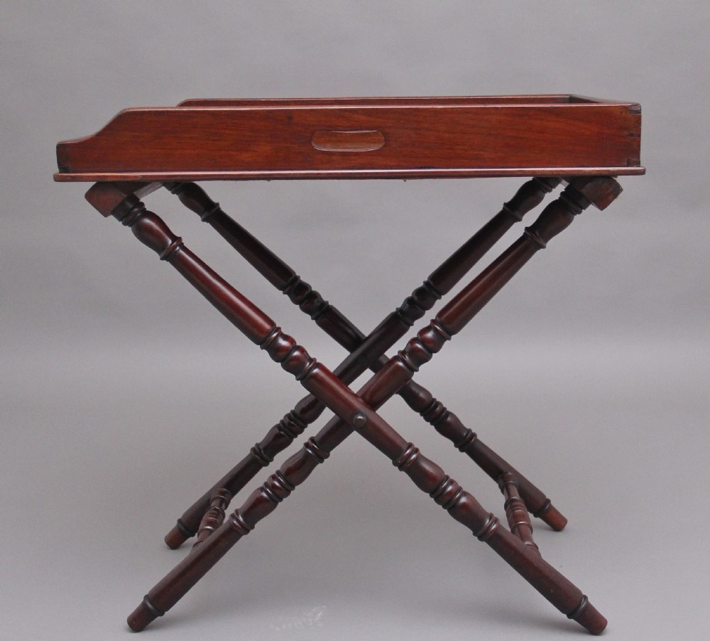 A lovely quality early 19th Century mahogany butlers tray on stand View V