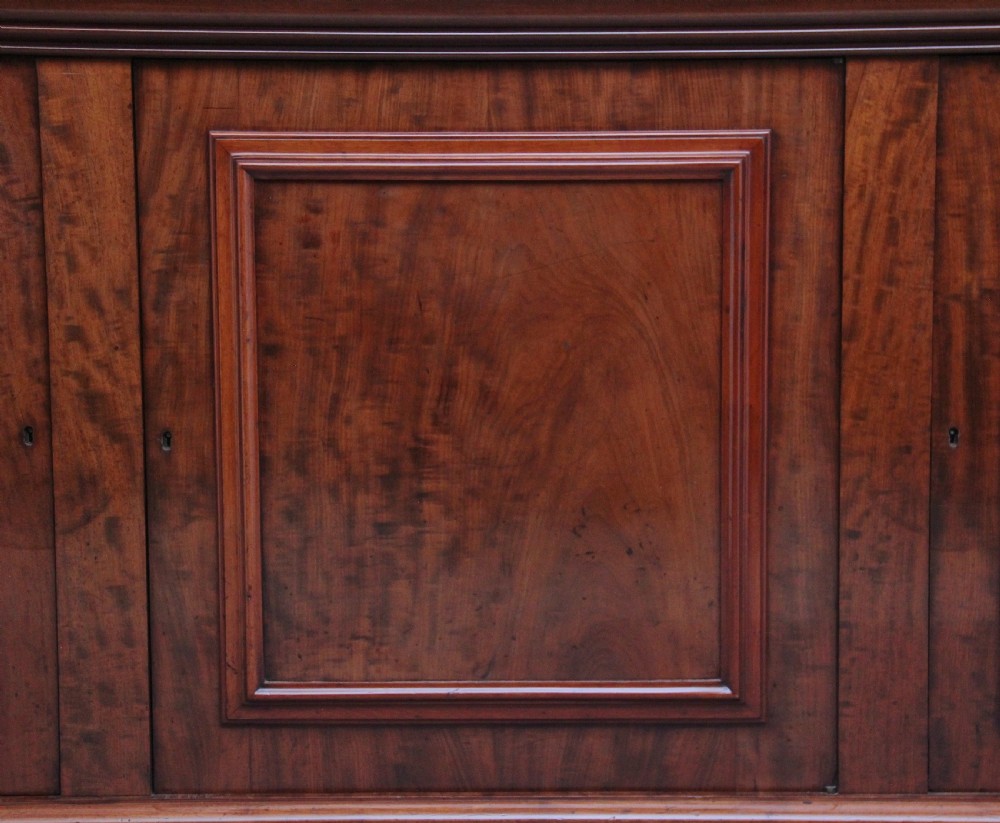 19th Century mahogany bookcase with a superb figured mahogany View VII