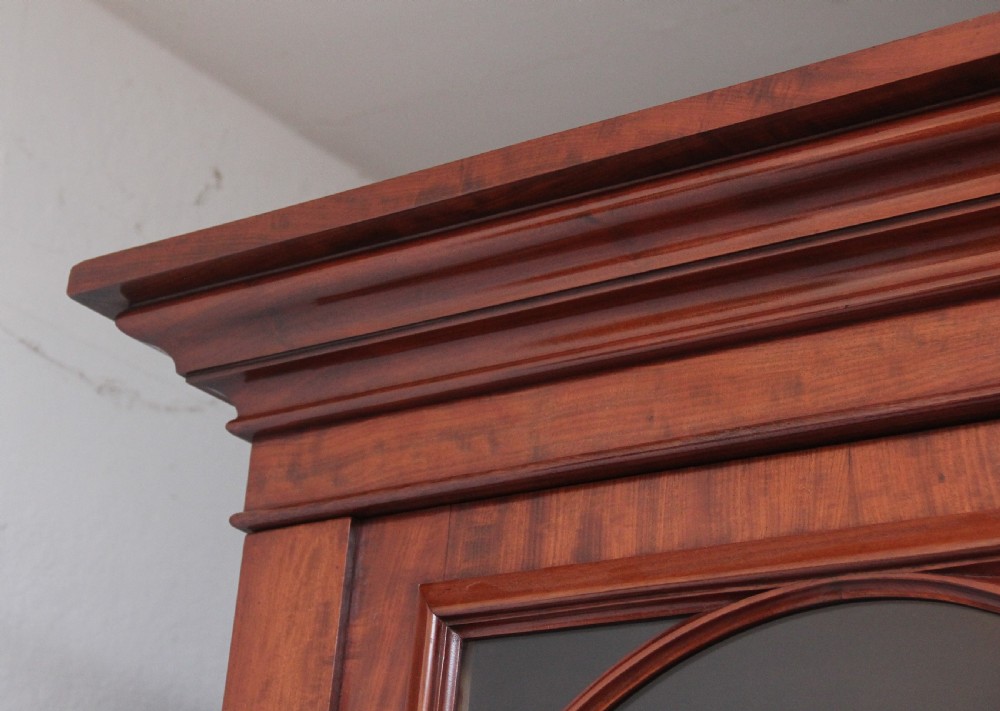 19th Century mahogany bookcase with a superb figured mahogany View VIII
