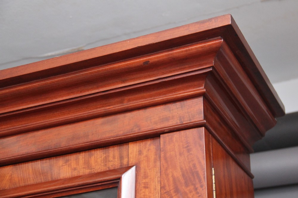 19th Century mahogany bookcase with a superb figured mahogany View X