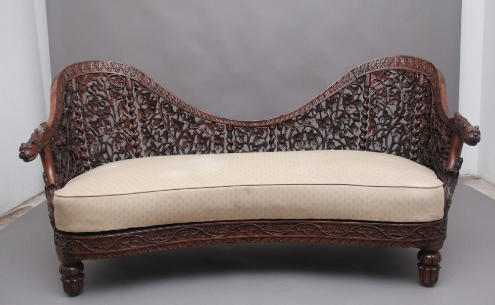 A superb quality 19th Century Anglo-Indian carved sofa