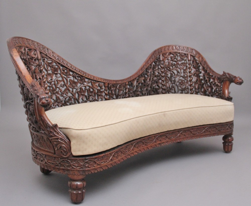 A superb quality 19th Century Anglo-Indian carved sofa View II