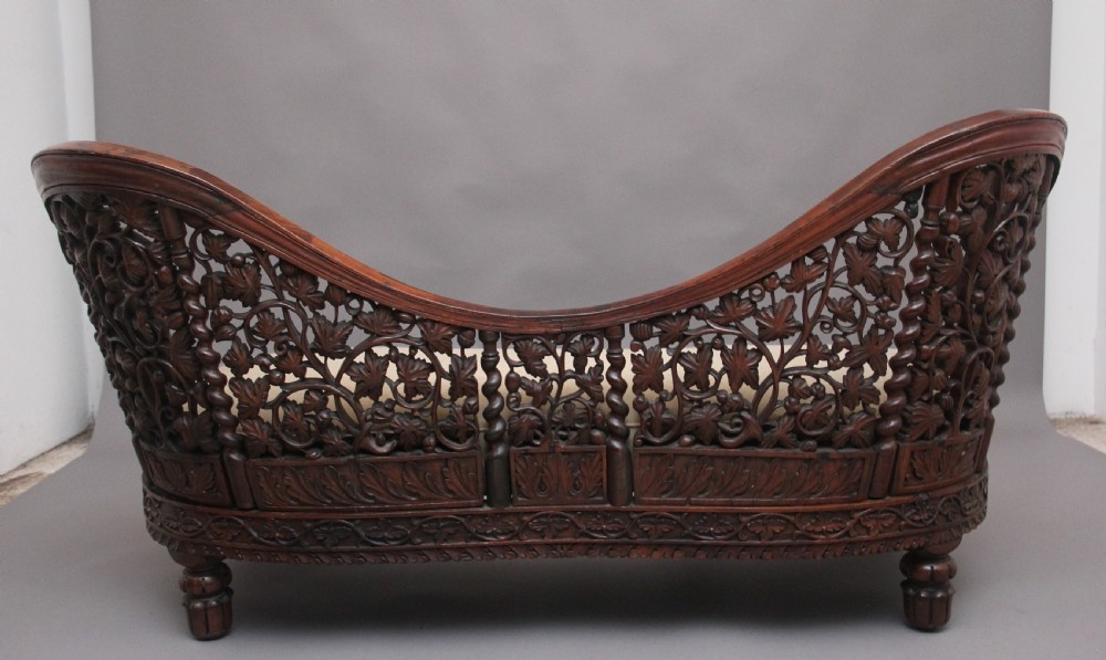 A superb quality 19th Century Anglo-Indian carved sofa View V