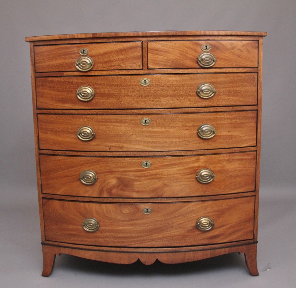 Quality Early 19th Century tall mahogany  bowfront chest of drawers