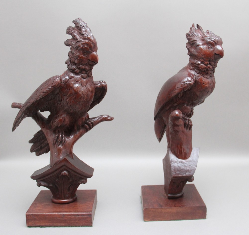 A pair of decorative 19th Century carved walnut parakeets  View III
