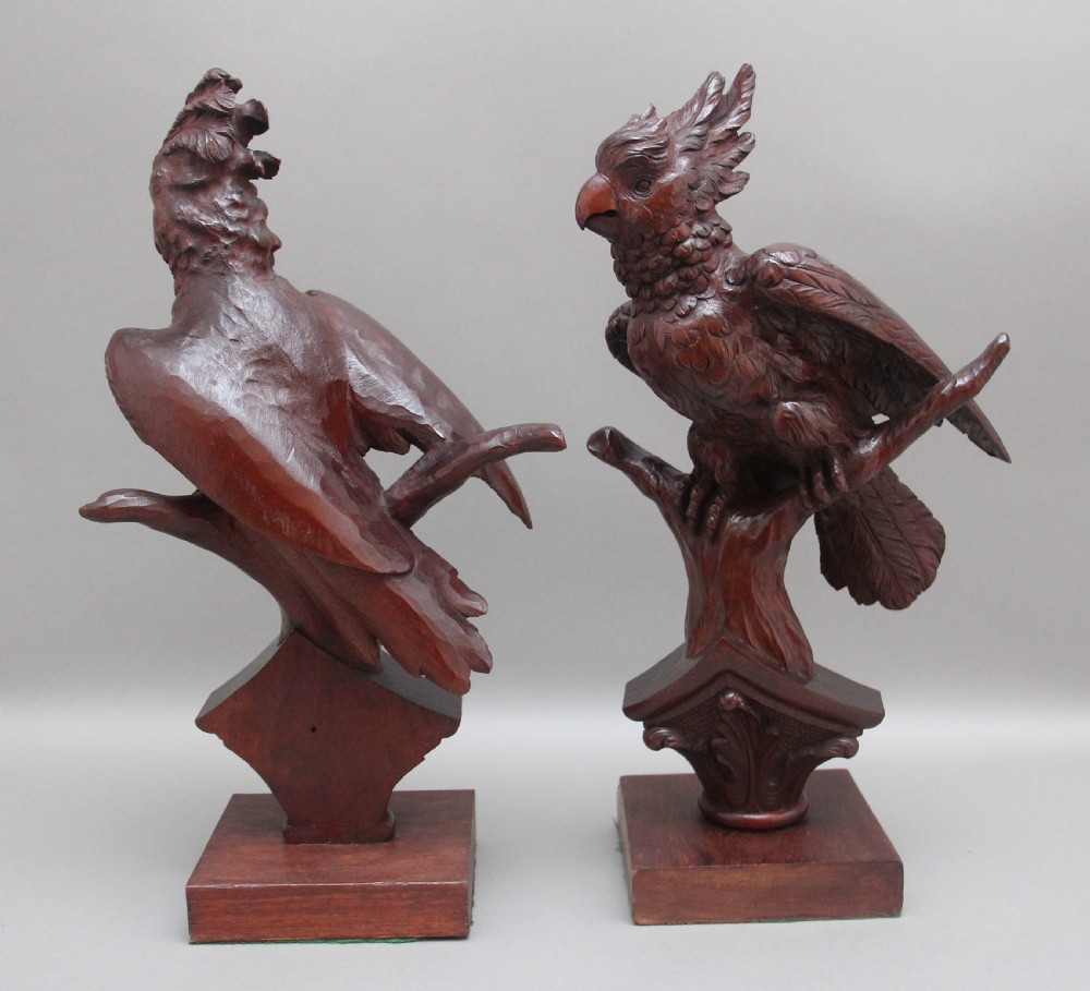 A pair of decorative 19th Century carved walnut parakeets  View VI