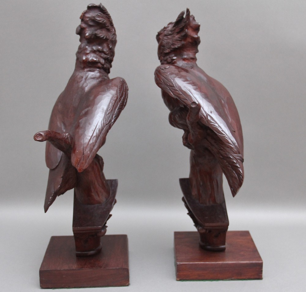 A pair of decorative 19th Century carved walnut parakeets  View VIII