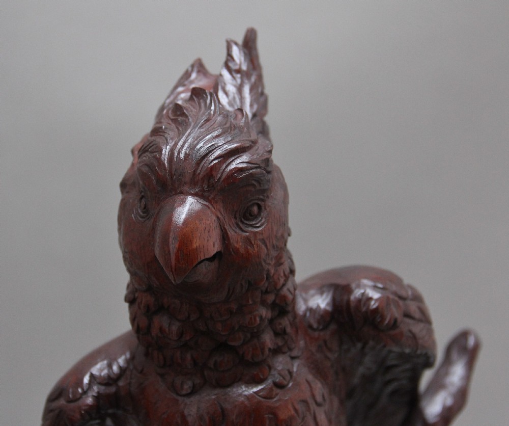 A pair of decorative 19th Century carved walnut parakeets  View IX
