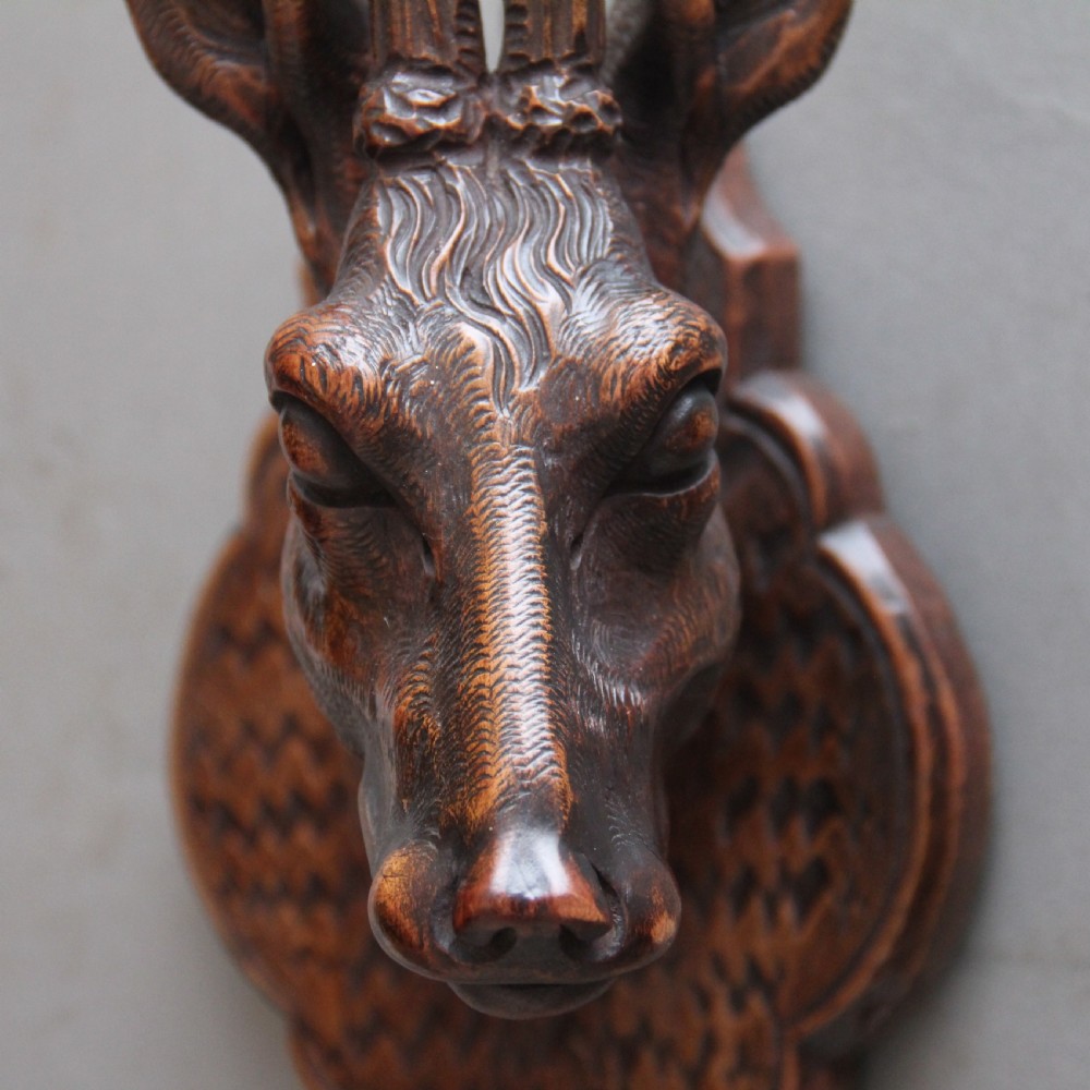 A pair of decorative 19th Century carved walnut black forest deer heads View IV