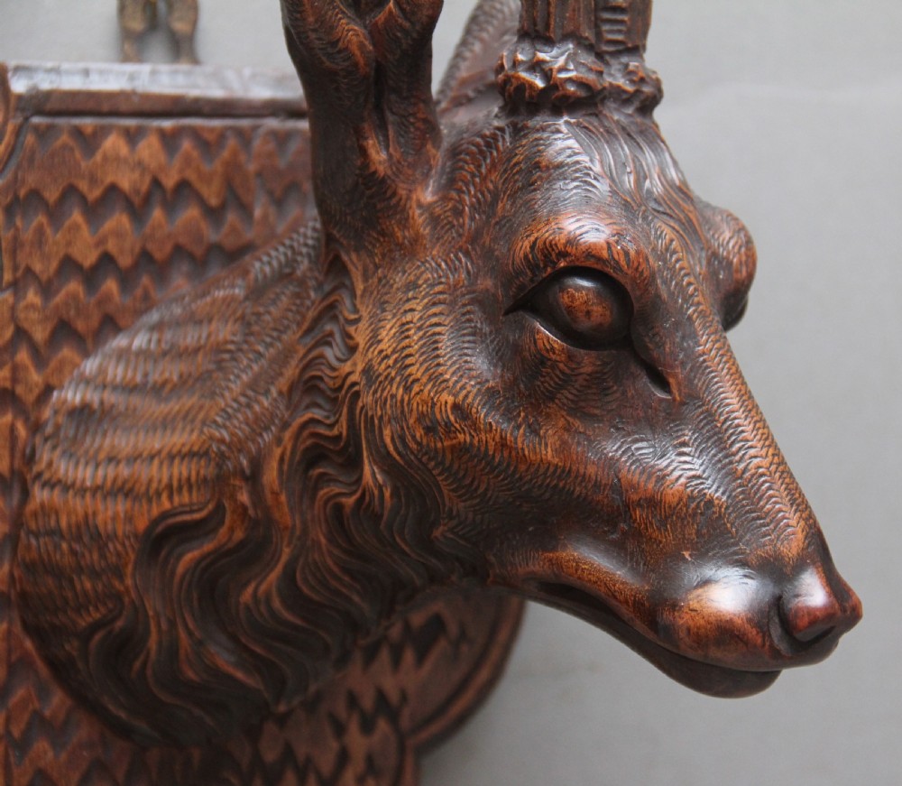 A pair of decorative 19th Century carved walnut black forest deer heads View V