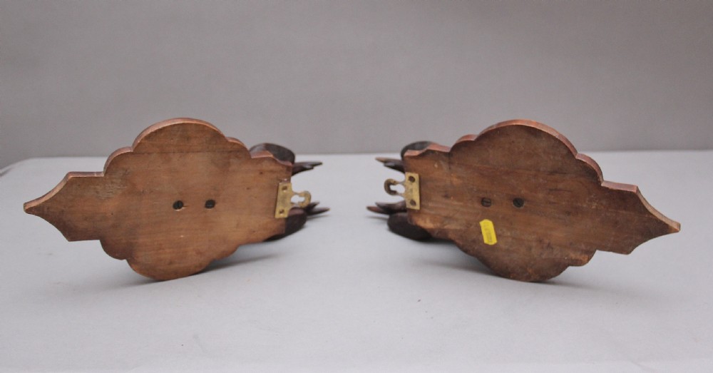 A pair of decorative 19th Century carved walnut black forest deer heads View VI