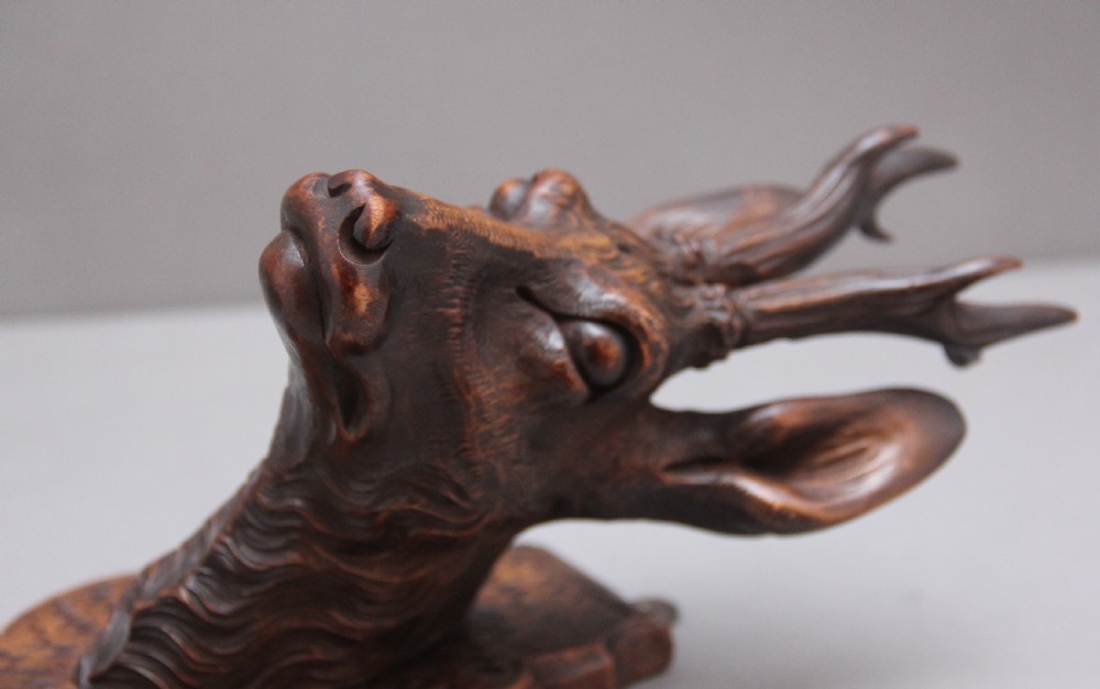 A pair of decorative 19th Century carved walnut black forest deer heads View IX