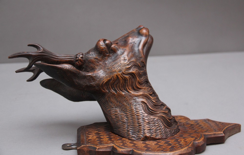 A pair of decorative 19th Century carved walnut black forest deer heads View X
