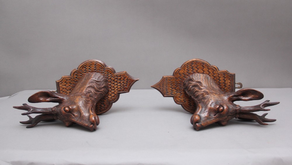 A pair of decorative 19th Century carved walnut black forest deer heads View XI