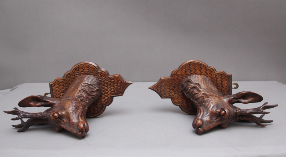 A pair of decorative 19th Century carved walnut black forest deer heads View XIII