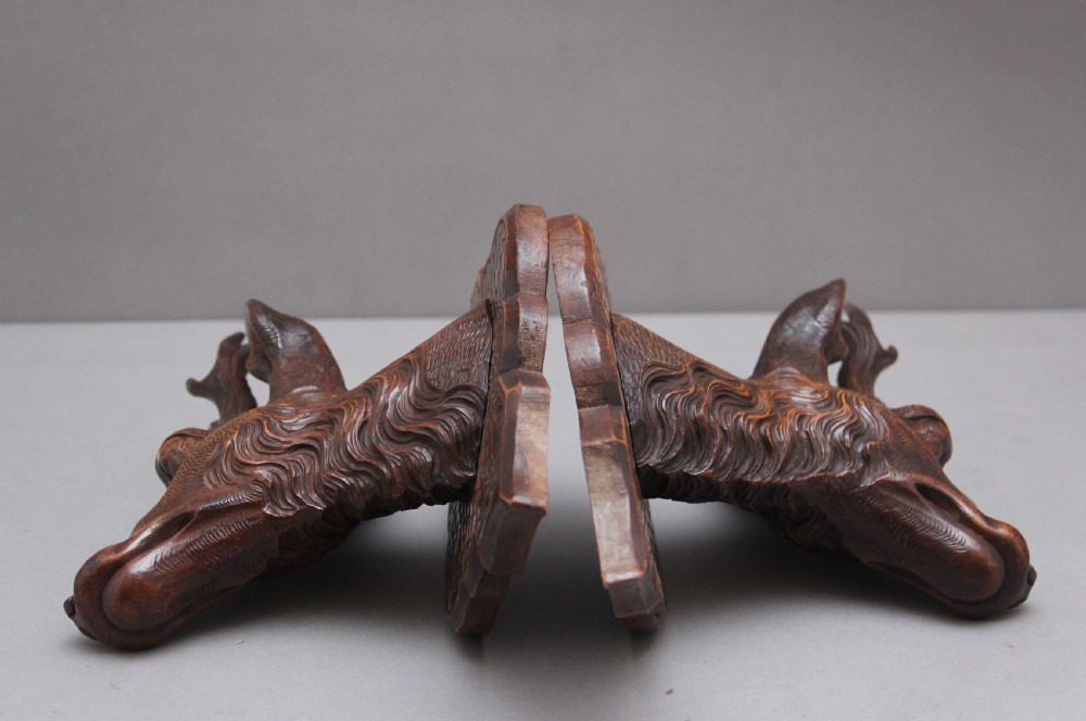 A pair of decorative 19th Century carved walnut black forest deer heads View XIV