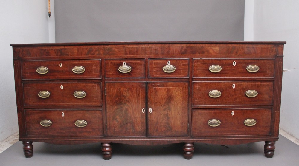 large early 19th Century mahogany and boxwood strung dresser base