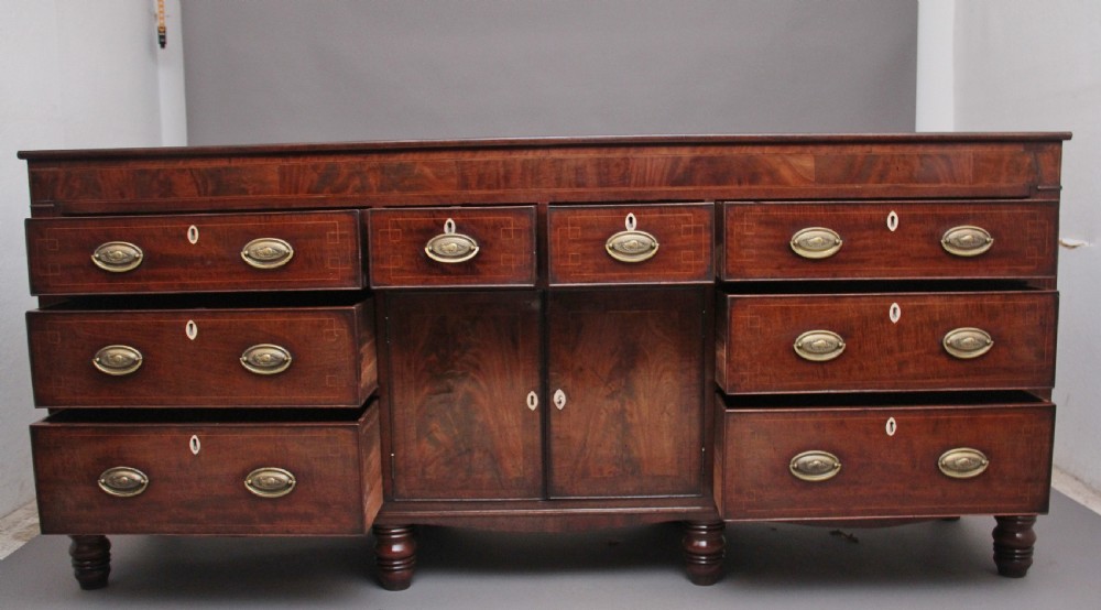 large early 19th Century mahogany and boxwood strung dresser base View III