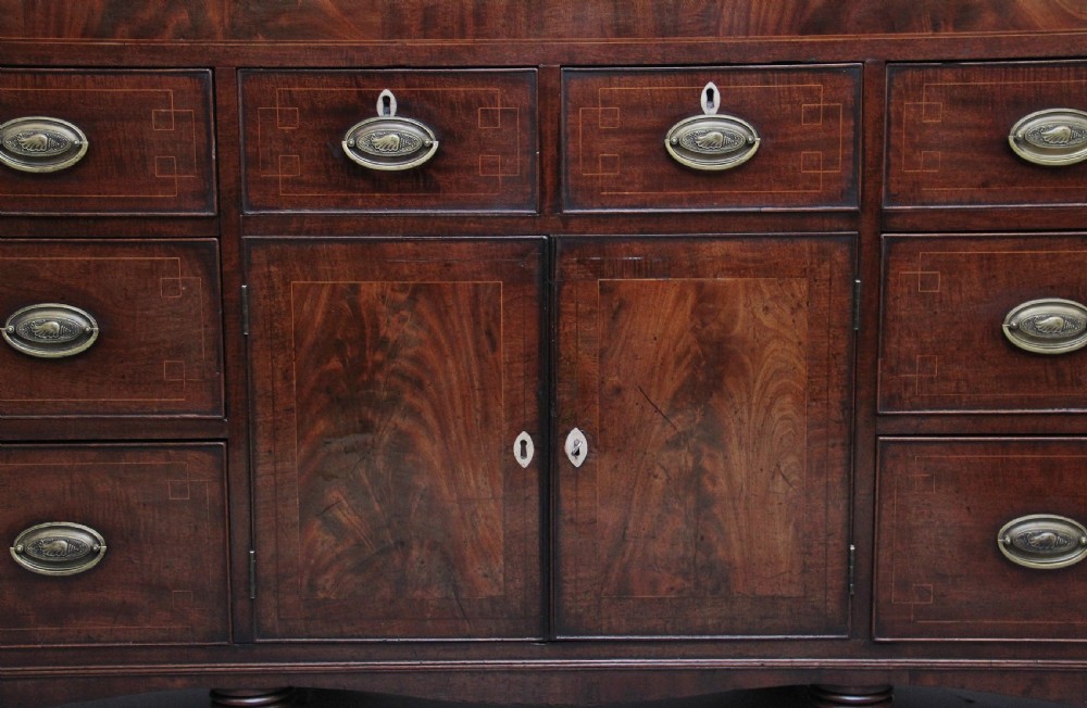 large early 19th Century mahogany and boxwood strung dresser base View VIII