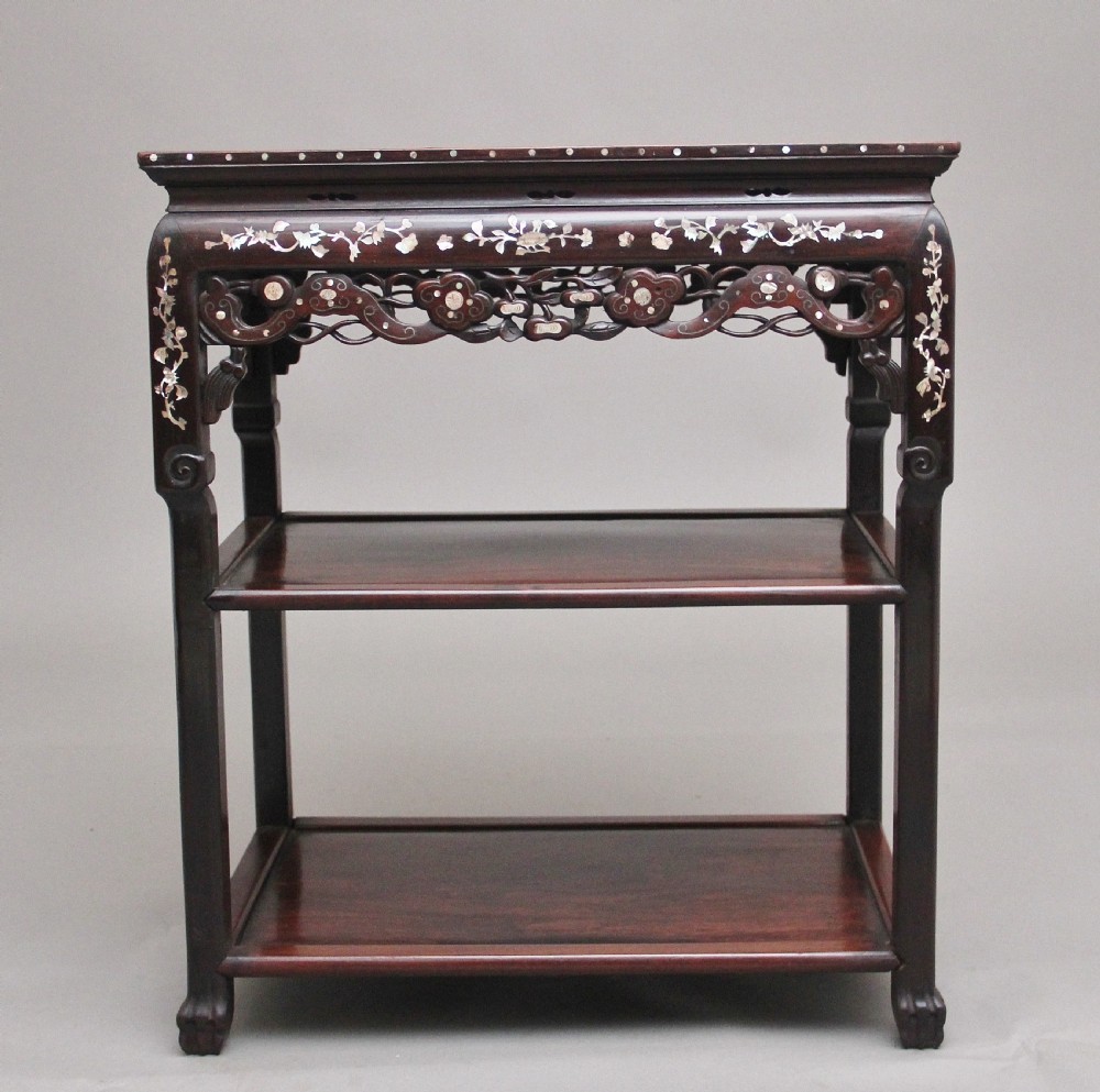 A dark hardwood Chinese three-tier occasional table featuring intricate mother-of-pearl floral inlay and a pink mottled marble top inset. View III