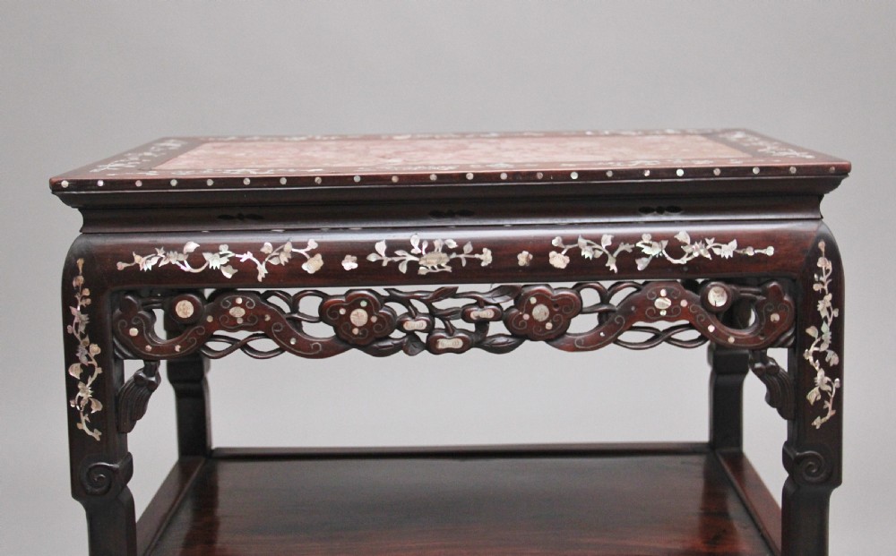 A dark hardwood Chinese three-tier occasional table featuring intricate mother-of-pearl floral inlay and a pink mottled marble top inset. View IV
