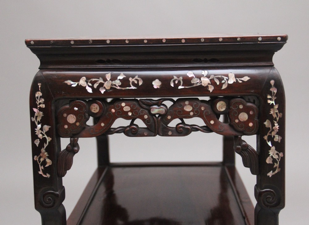 A dark hardwood Chinese three-tier occasional table featuring intricate mother-of-pearl floral inlay and a pink mottled marble top inset. View VII