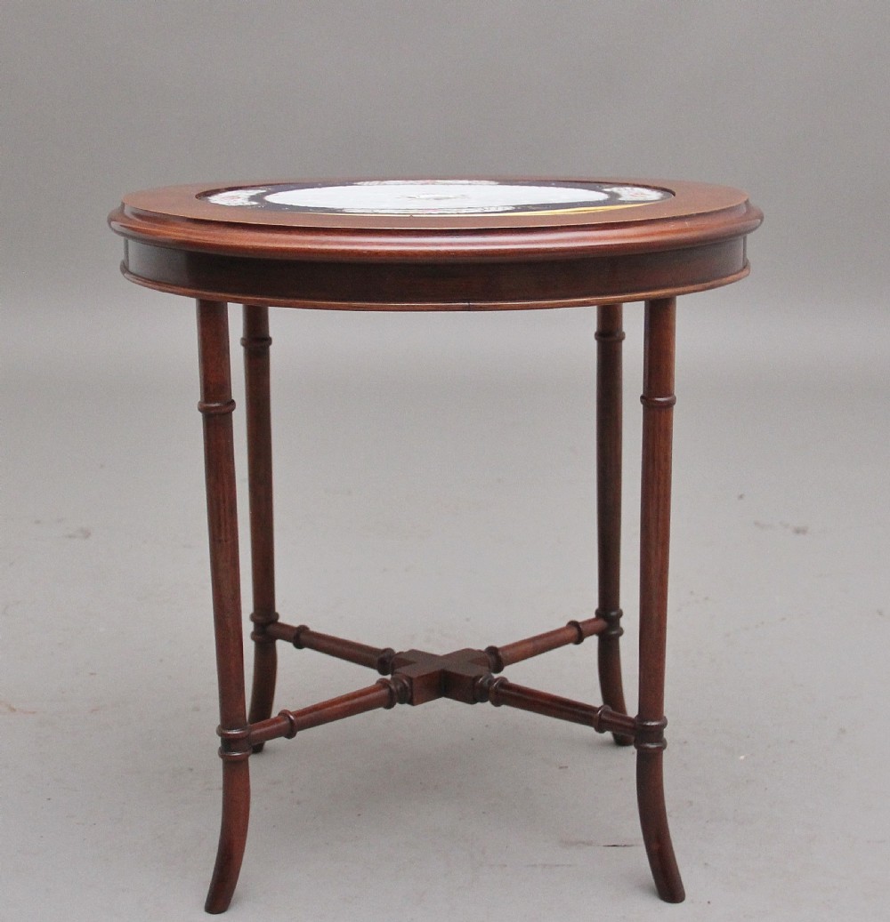 Early 20th Century mahogany occasional table with a ceramic inset View III