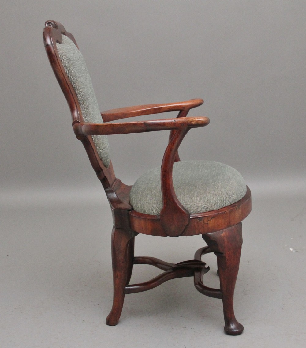 A fabulous quality and very rare George II walnut armchair View II