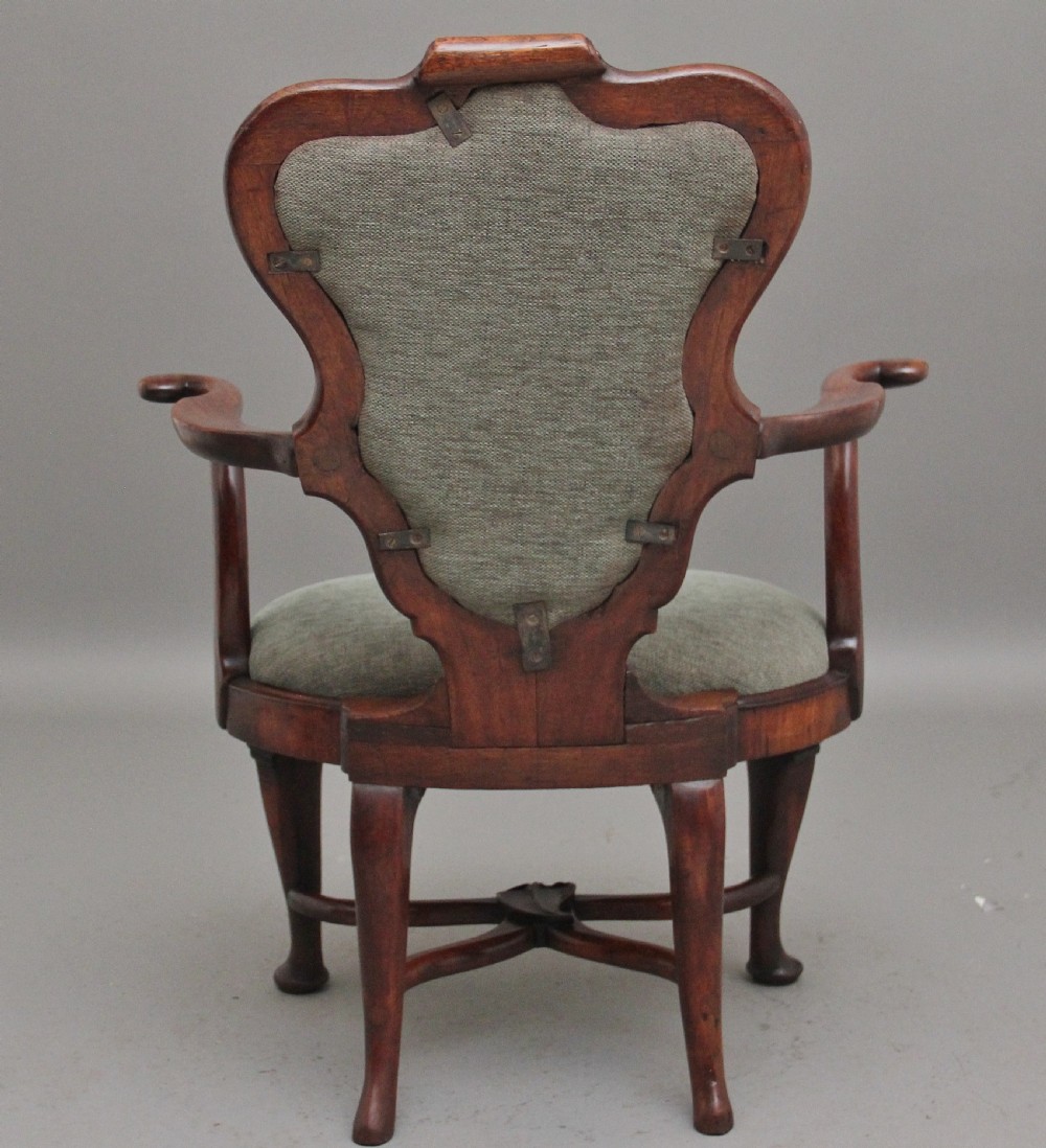 A fabulous quality and very rare George II walnut armchair View III