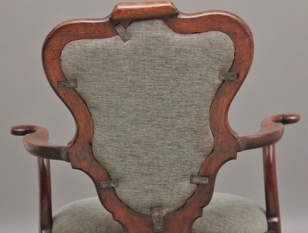 A fabulous quality and very rare George II walnut armchair View IV