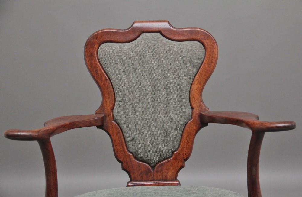 A fabulous quality and very rare George II walnut armchair View VII