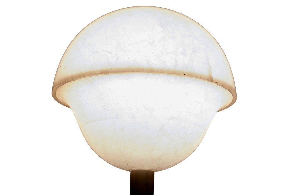 An early 20th-century Swedish floor lamp carved from white alabaster, featuring a classical female figure atop a columnar pedestal supporting a globe light shade. View IX