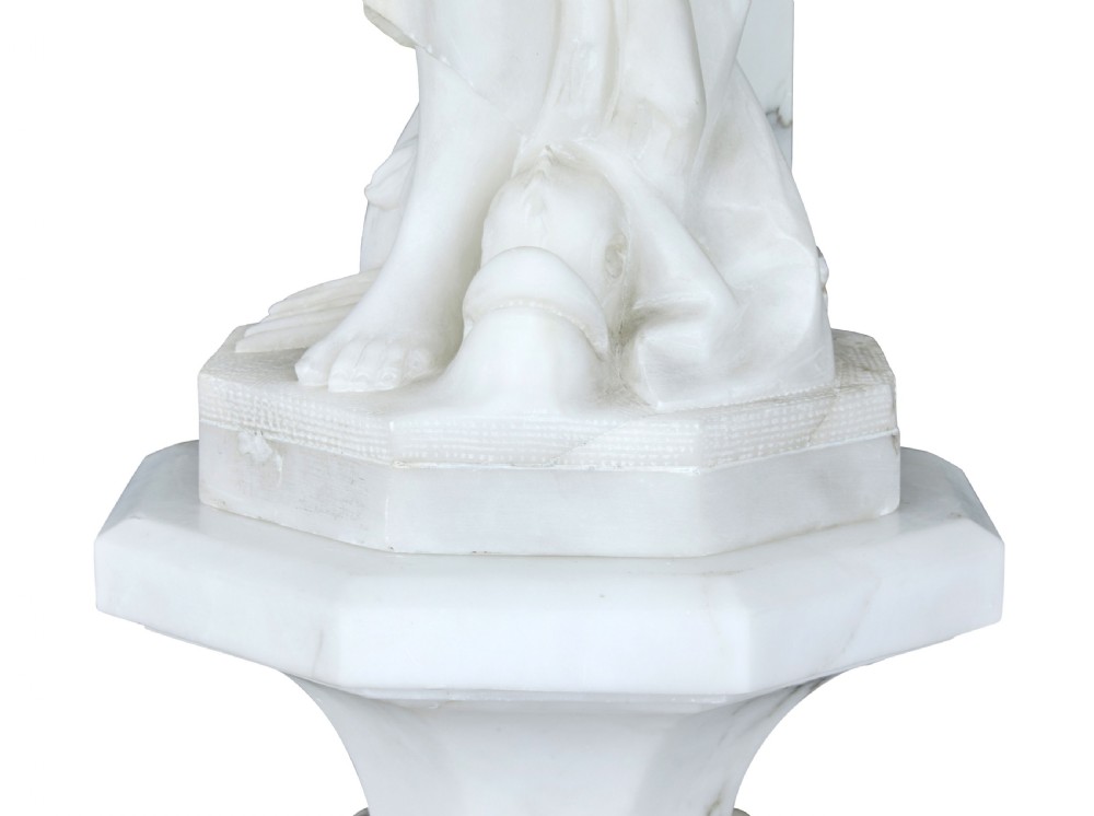 An early 20th-century Swedish floor lamp carved from white alabaster, featuring a classical female figure atop a columnar pedestal supporting a globe light shade. View XII